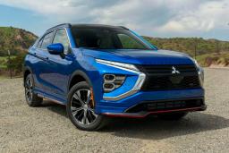 2022 Mitsubishi Eclipse Cross LE front right in blue